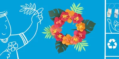 Een krans van kleurrijke bloemen en een slinger van lantaarns gemaakt van gerecycled karton met geïllustreerde mensen